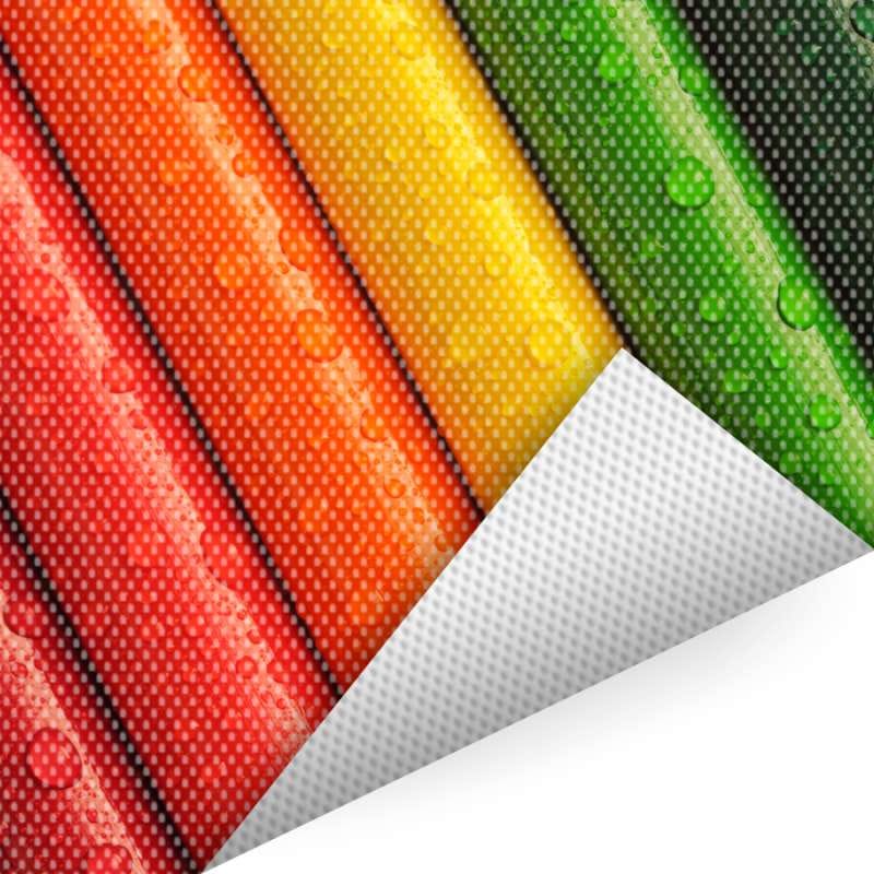 Banen meshdoek in rood, oranje, geel en groen met zichtbare perforatie