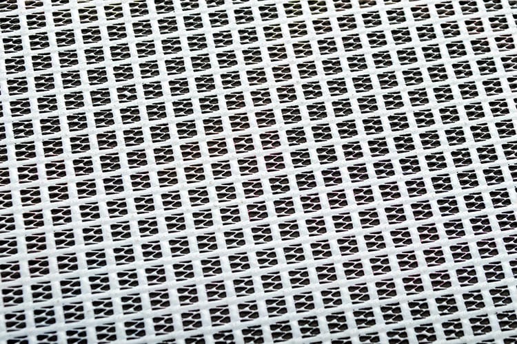 Onbedrukt speaker-mesh van dichtbij met het open, rasterachtige weefsel